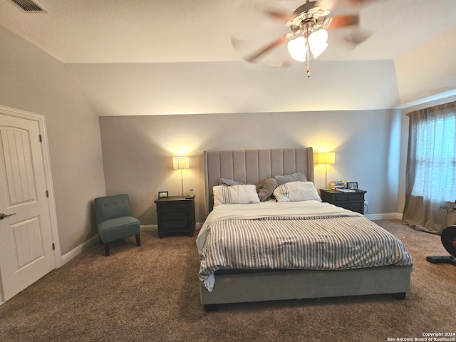 carpeted bedroom featuring ceiling fan and vaulted ceiling