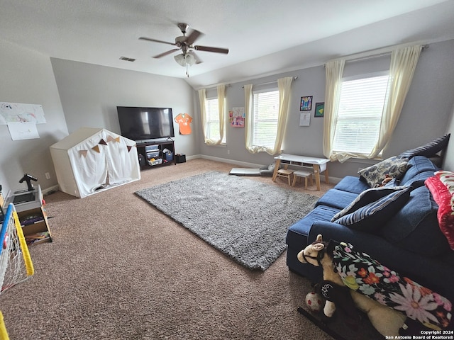 living room with ceiling fan and carpet flooring