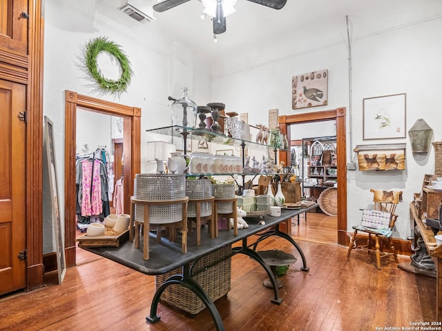 miscellaneous room with hardwood / wood-style floors and ceiling fan