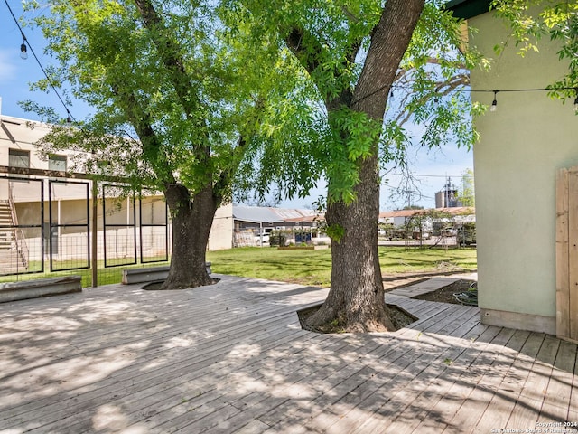 deck featuring a yard