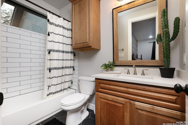 full bathroom with tile floors, vanity, shower / bath combination with curtain, and toilet