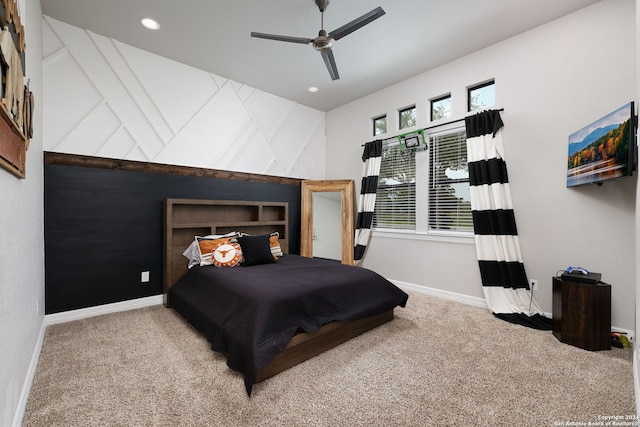 carpeted bedroom with ceiling fan