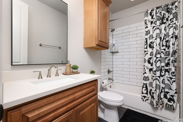 full bathroom featuring toilet, shower / bath combination with curtain, and vanity