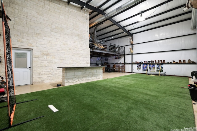 garage with a lawn