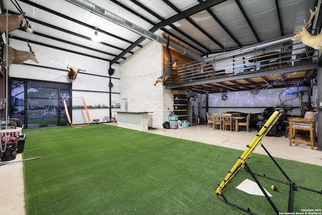 garage featuring a lawn