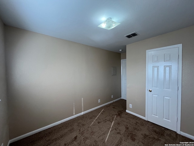 unfurnished bedroom featuring carpet