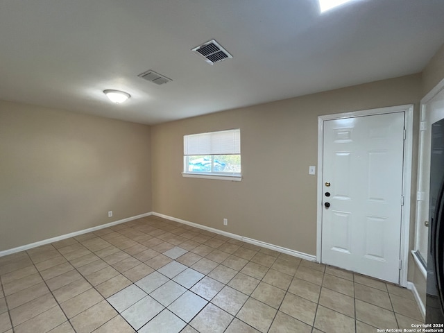 view of tiled entrance foyer