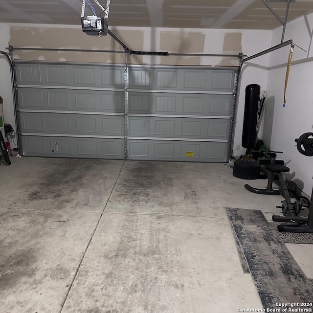 garage featuring a garage door opener