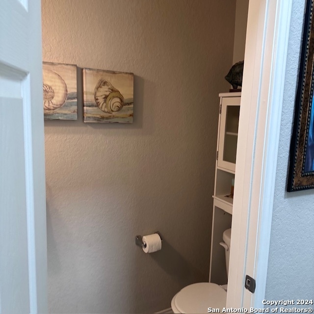 bathroom featuring toilet