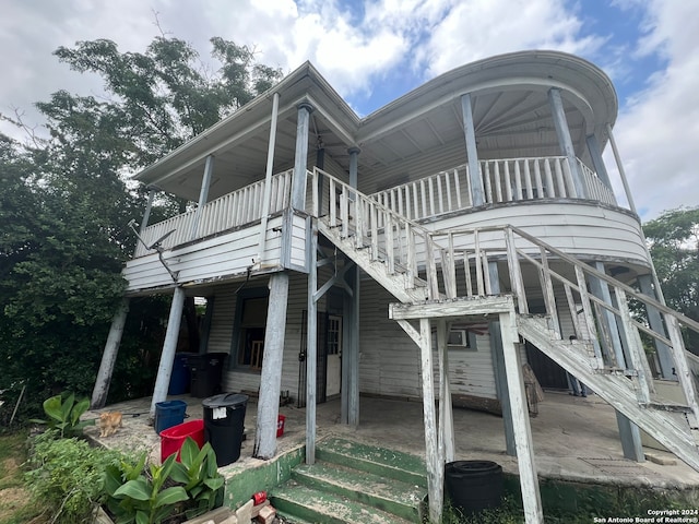 back of property featuring a patio