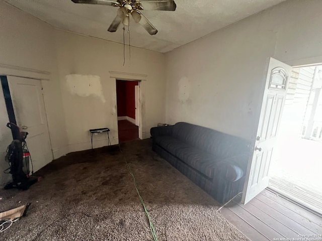 interior space featuring ceiling fan