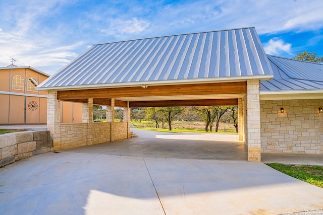 garage featuring a carport