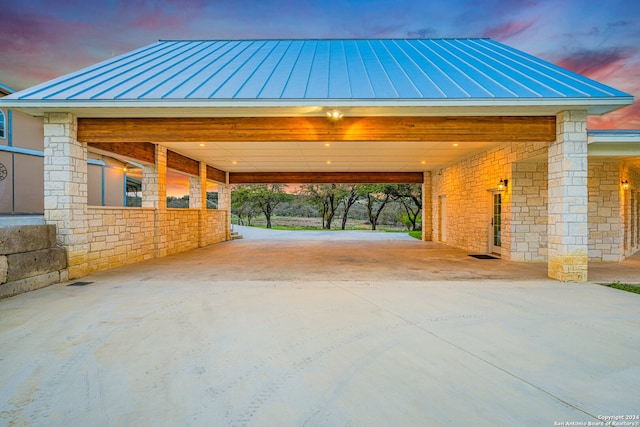 exterior space with a carport