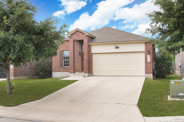 ranch-style house featuring a front lawn and a garage