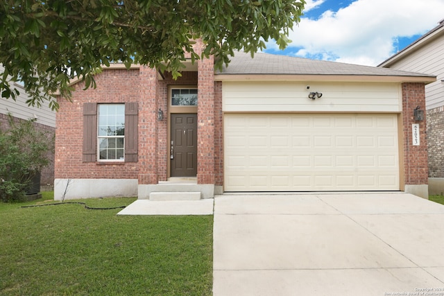 view of front facade with a garage and a front yard