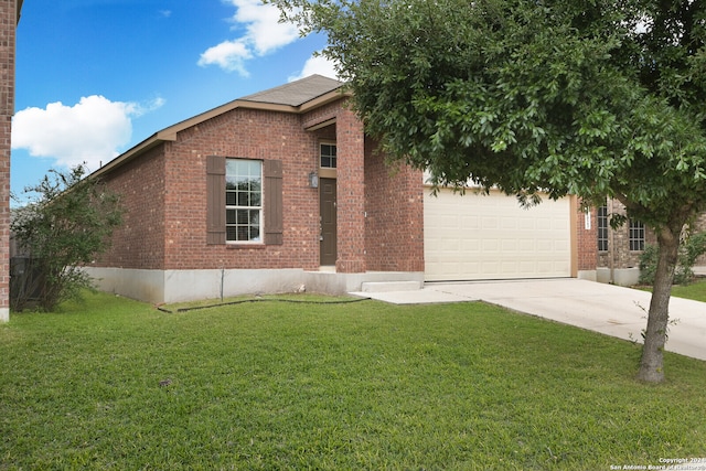 view of front of home with a garage and a front yard