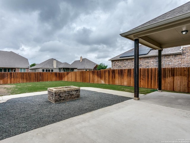 view of terrace featuring a fire pit