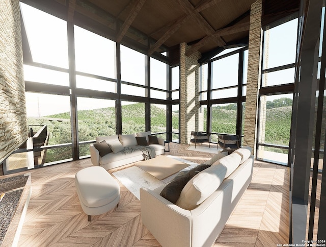 sunroom / solarium featuring beam ceiling