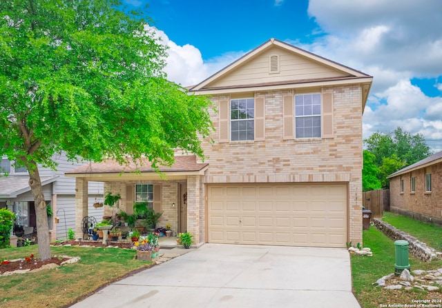 front facade featuring a front yard and a garage