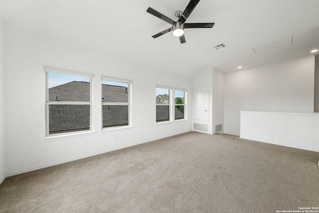 empty room with ceiling fan and carpet floors