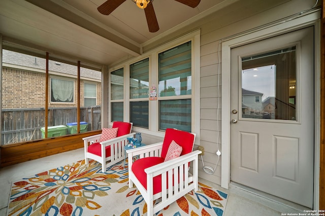 sunroom / solarium with ceiling fan