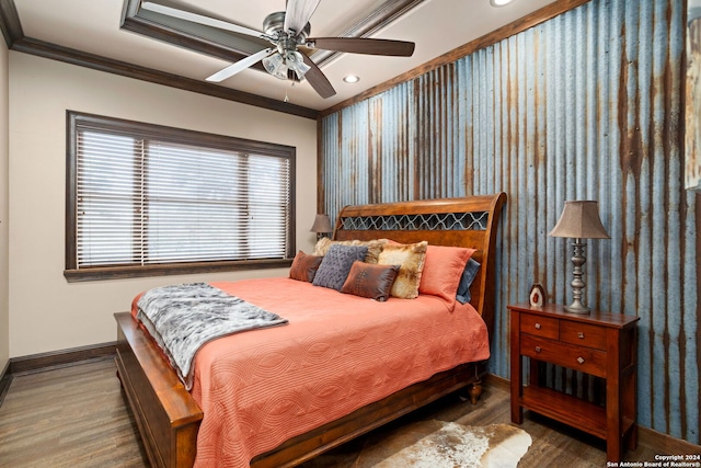 bedroom with ceiling fan, dark wood-type flooring, and crown molding