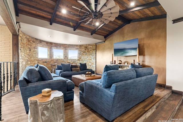 living room featuring hardwood / wood-style floors, ceiling fan, lofted ceiling with beams, and wood ceiling