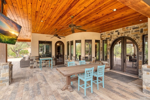 view of patio featuring french doors and ceiling fan