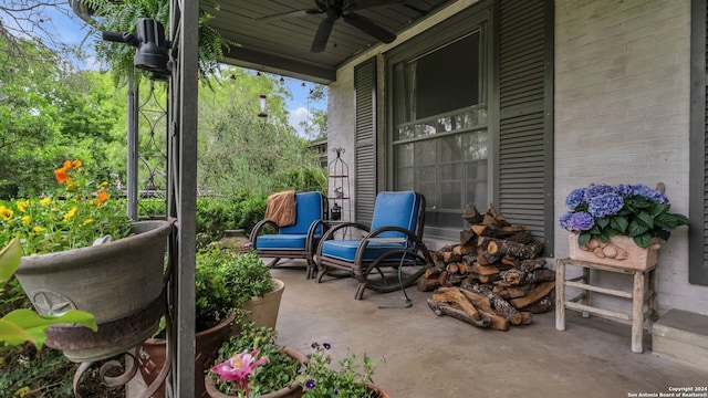 view of patio / terrace featuring ceiling fan