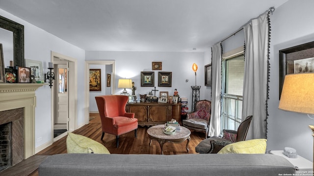 living room with plenty of natural light and hardwood / wood-style floors