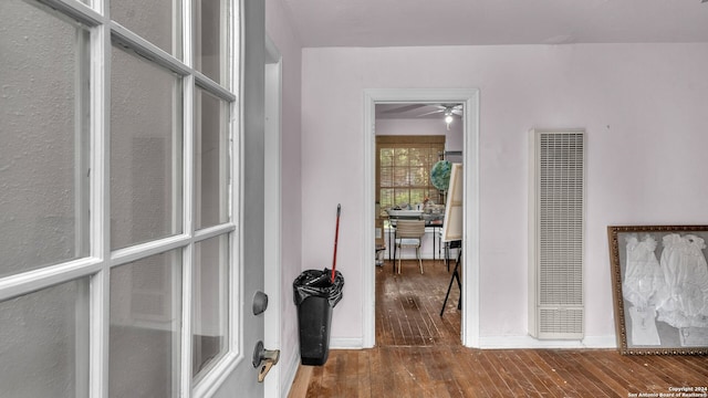 hallway featuring dark hardwood / wood-style floors