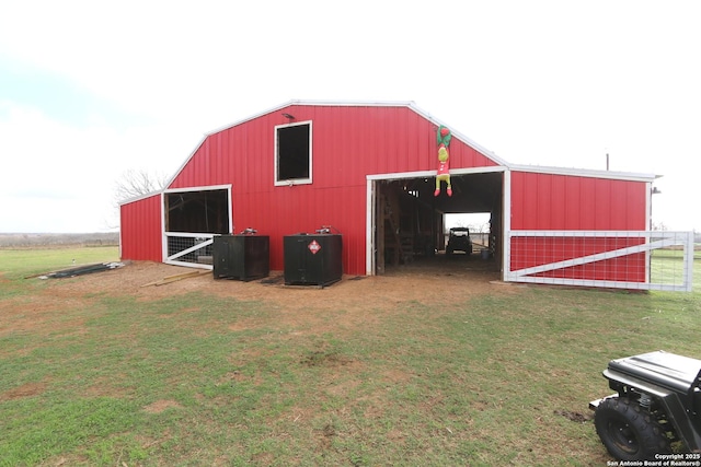 view of outdoor structure with a yard