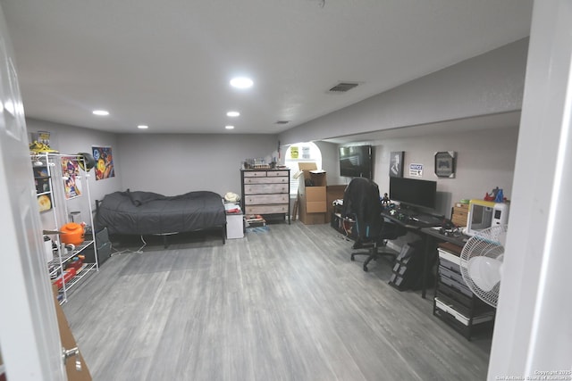 bedroom featuring hardwood / wood-style floors