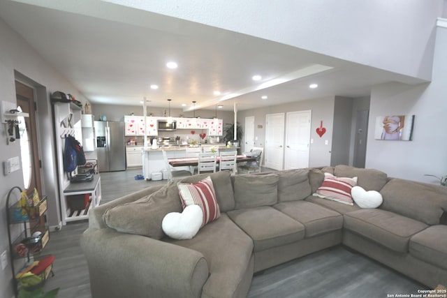 living room featuring dark hardwood / wood-style floors