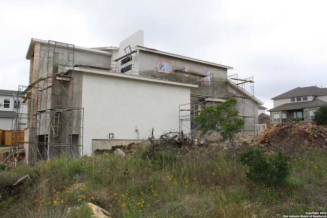 view of home's exterior with stucco siding