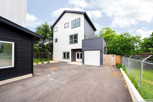 view of property exterior featuring a garage