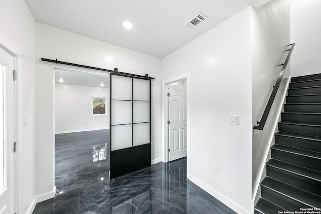 interior space with a barn door