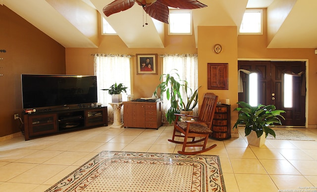 tiled living room with a towering ceiling and ceiling fan