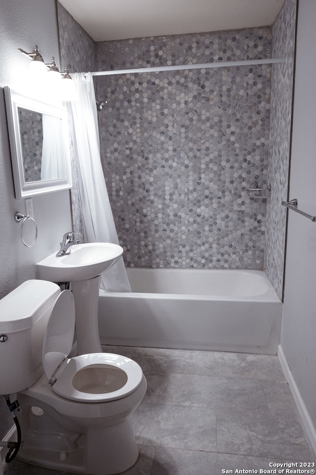 bathroom featuring shower / tub combo with curtain, tile floors, and toilet