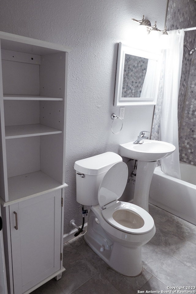 bathroom featuring tile floors, shower / bathtub combination with curtain, and toilet