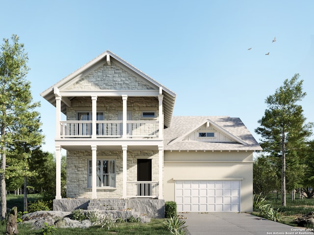 view of front facade with a balcony and a garage