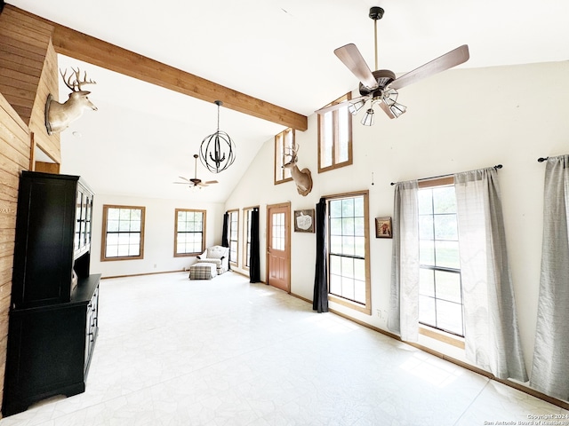 tiled living room with beamed ceiling, ceiling fan with notable chandelier, and high vaulted ceiling