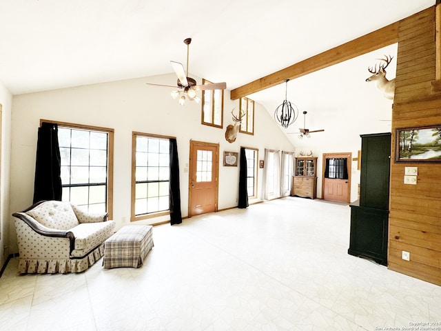 living area with beamed ceiling, high vaulted ceiling, ceiling fan, and tile floors