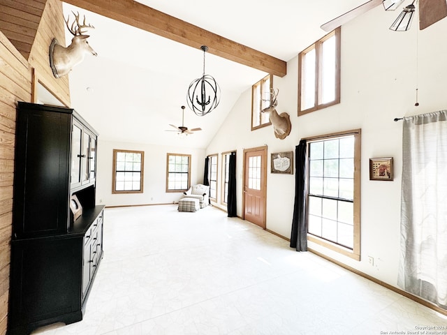 interior space featuring high vaulted ceiling, beam ceiling, and ceiling fan