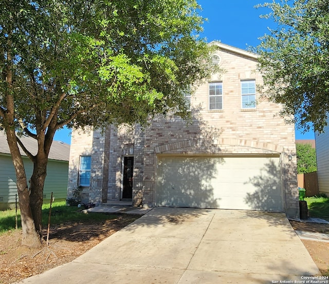 view of property featuring a garage