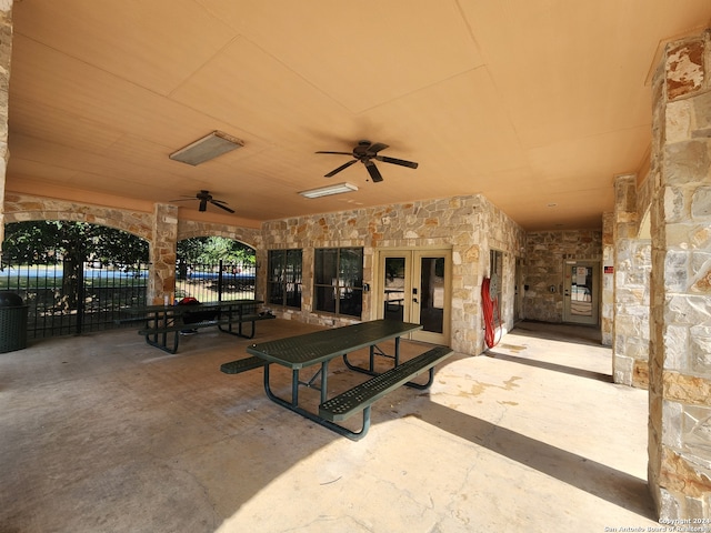 view of patio / terrace featuring french doors and ceiling fan