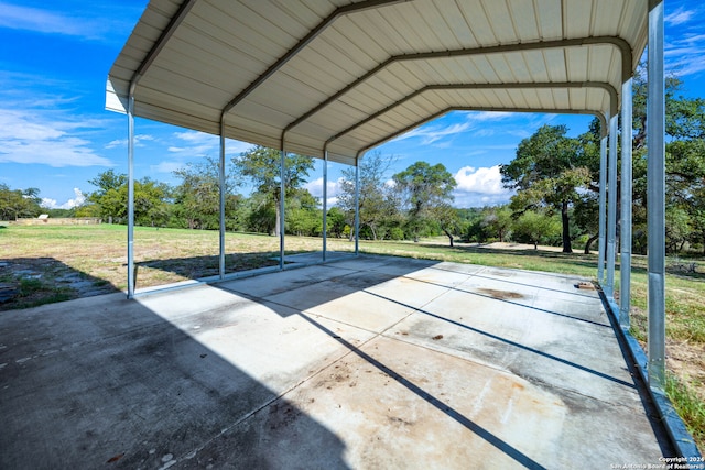 view of patio / terrace featuring a carport