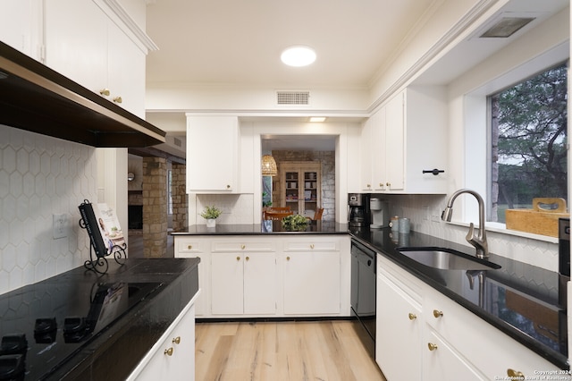 kitchen featuring tasteful backsplash and white cabinetry