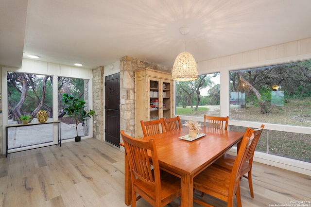 dining area featuring light wood-type flooring