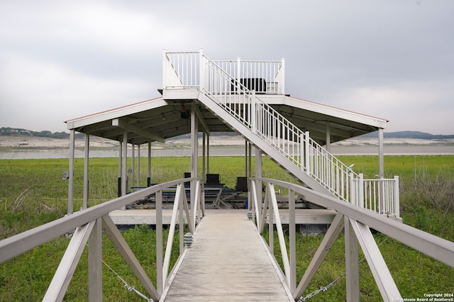 dock area with a water view